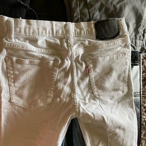 Jeans white in color